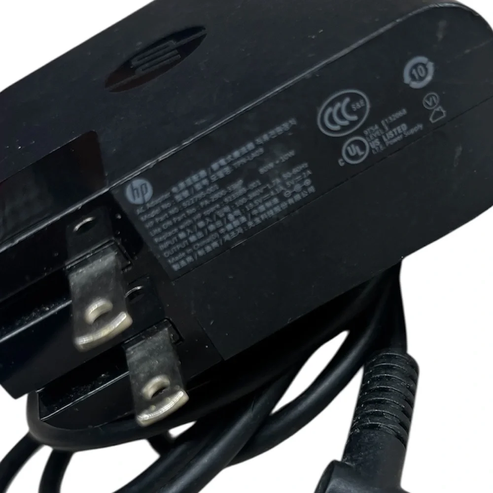 HP 65W Smart AC Power Adapter with a 4.5mm blue tip connector